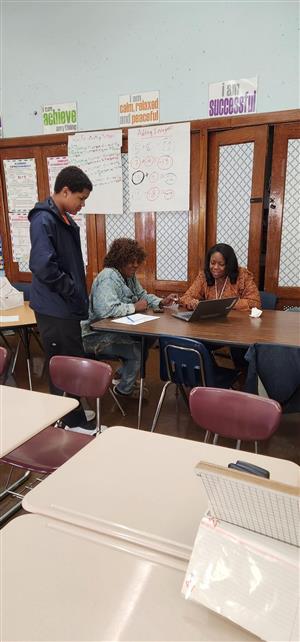 Ms. Johnson speaks with a family